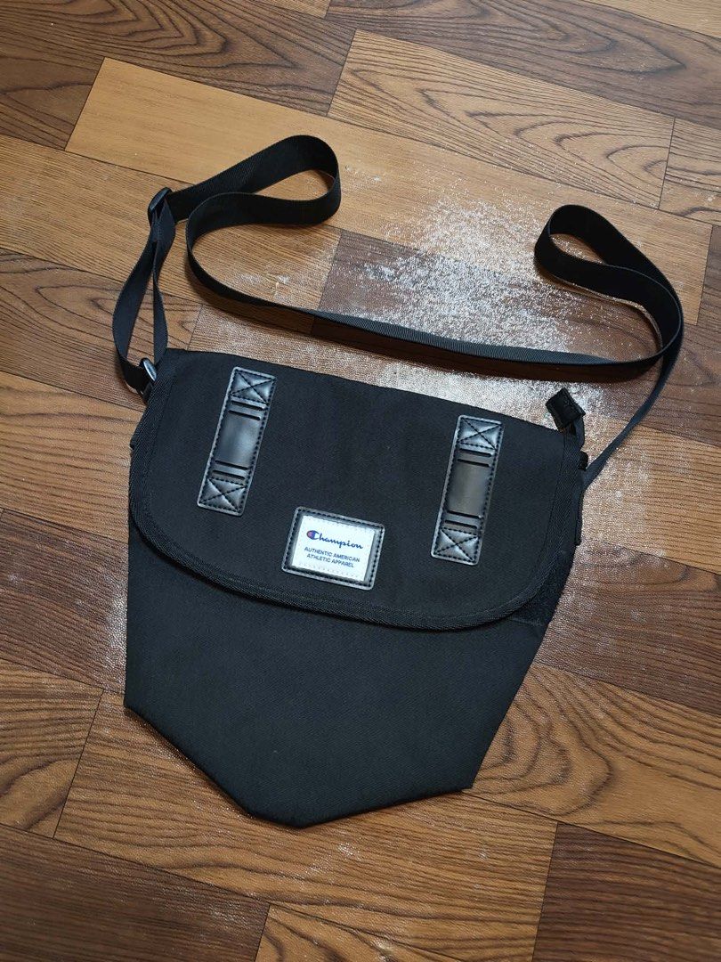 Champion sling bag (Category: Luxury Bags & Wallets) located in Tumauini. Submitted by calmearth-bc99 (Listing ID 1463753323, Image 1). Description: Champion sling bag.