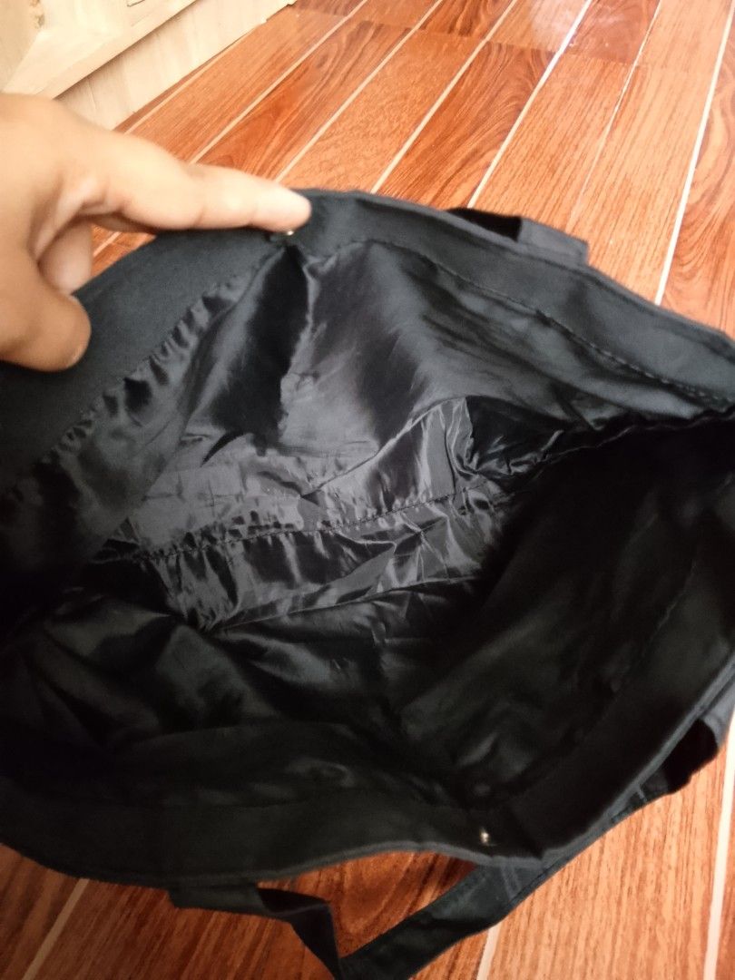 Chanel Black Sequins CC Logo Tote Bag (Category: Tote Bags) located in Manila. Submitted by wildwind_73f77a (Listing ID 1461590404, Image 3). Description: - Classic black Chanel tote bag - Features iconic CC logo with sequins - Durable material, perfect for daily use - Spacious interior for essentials - Comfortable straps for easy carrying - Stylish and practical design.