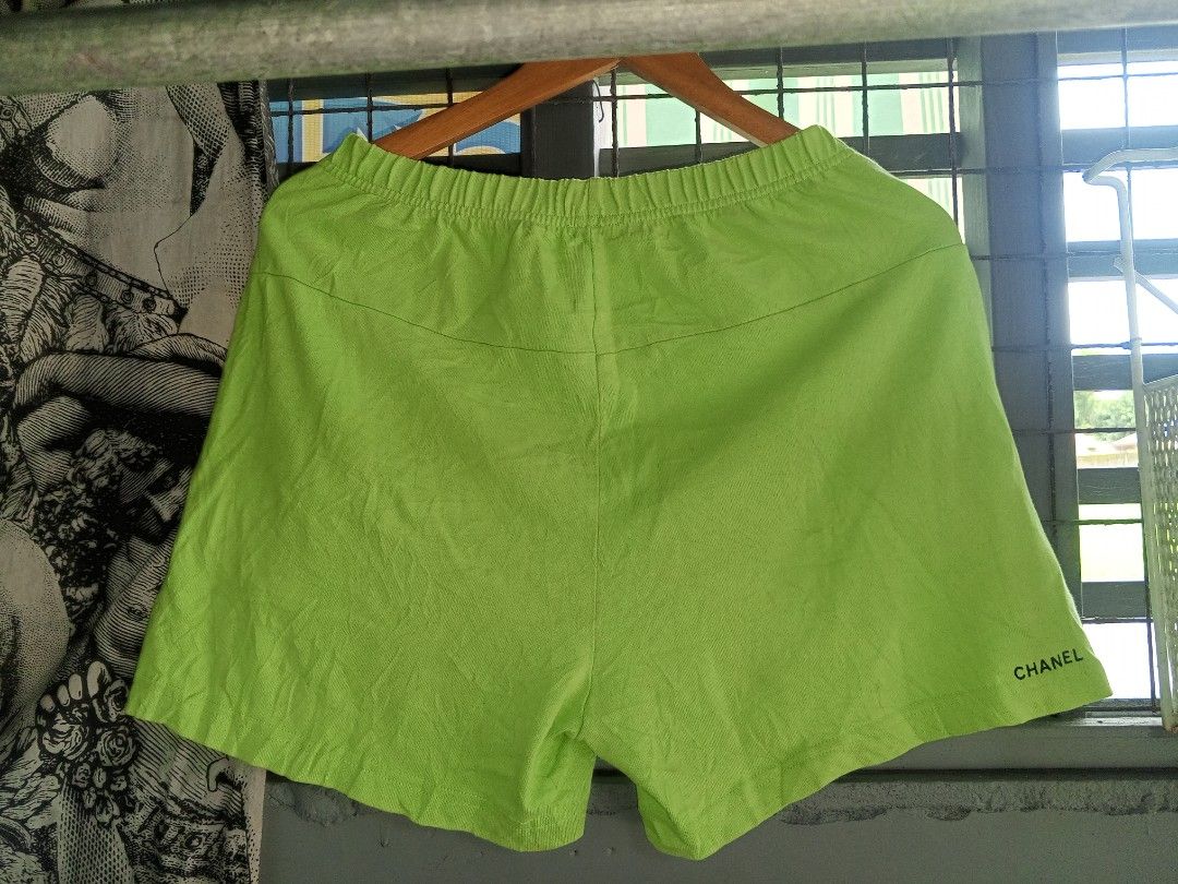 Chanel Lime Green Shorts (Category: Luxury Apparel) located in Magalang. Submitted by zeiansoria64090 (Listing ID 1463767823, Image 2). Description: - Chanel lime green shorts - Comfortable elastic waistband - Iconic Chanel logo embroidered on one leg - Chanel brand name embroidered on the other leg - Ideal for casual wear or lounging - Stylish and comfortable.