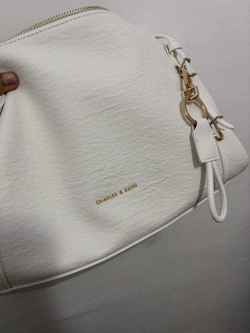 Charles & Keith Medium Levy (White) (Category: Shoulder Bags) located in Rizal. Submitted by prelovedbykristel (Listing ID 1463928907, Image 3). Description: with dustbag! :) i prefer black - MOP : BDO / Gcash - MOD : Lalamove ❌ no refund! :) .