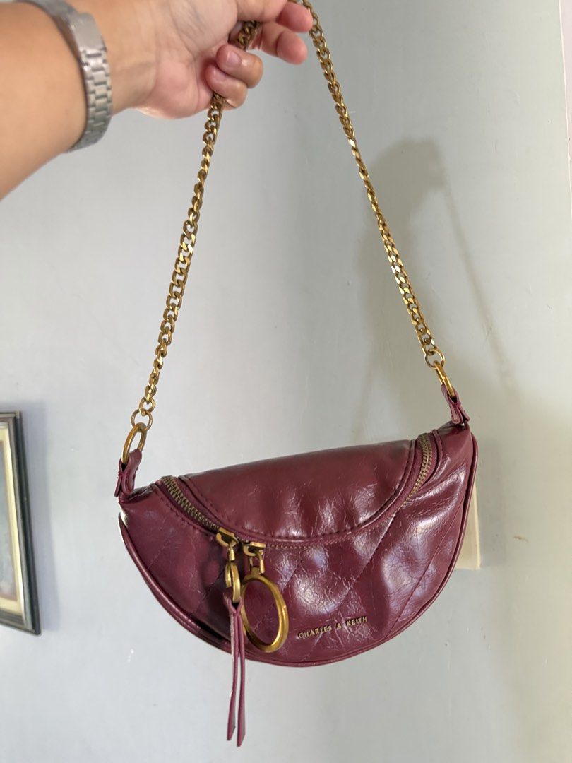 Charles & Keith Philomena Half-Moon Bag (Category: Shoulder Bags) located in Cadiz. Submitted by solynb28 (Listing ID 1463768549, Image 2). Description: -thrifted preloved -wrinkled-effect, zipper closure -clean and ready to use -chain lang ang meron sya, wla na yung long strap nya -negotiable price ▫️what you see is what you get▫️colors may vary due tolighting▫️buy at your own risk ▫️no long reservation, unless the item is paid▫️payment 1st poli