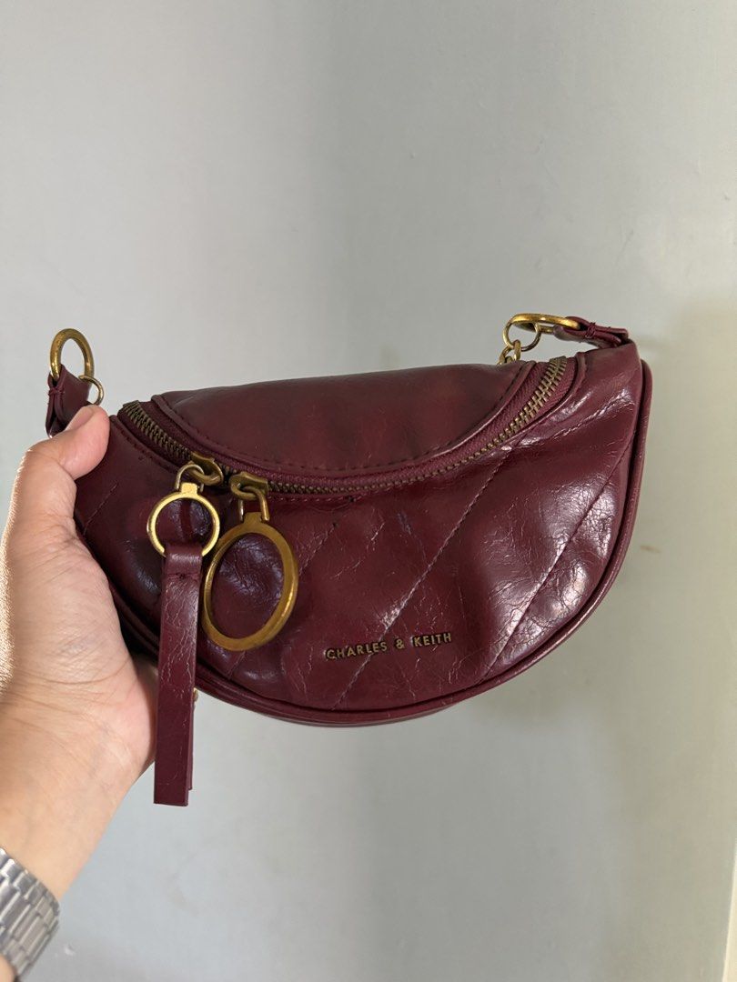Charles & Keith Philomena Half-Moon Bag (Category: Shoulder Bags) located in Cadiz. Submitted by solynb28 (Listing ID 1463768549, Image 1). Description: -thrifted preloved -wrinkled-effect, zipper closure -clean and ready to use -chain lang ang meron sya, wla na yung long strap nya -negotiable price ▫️what you see is what you get▫️colors may vary due tolighting▫️buy at your own risk ▫️no long reservation, unless the item is paid▫️payment 1st poli
