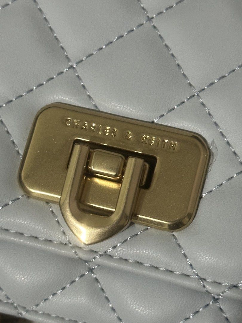 Charles and Keith Quilted Chain-Handle bag (Category: Cross-body Bags) located in Carmona. Submitted by helloimtelle (Listing ID 1463849385, Image 2). Description: decluttering! carmona / biñan location 📍 can do j&t, lbc or lalamove for 🚚 og price: 4k bought from store in bgc selling price: 1650 (nego) preloved like-new ch*arles and k*eith quilted chain-handle bag in seasalt blue color size: 18 × 11 × 7 cm color: seasalt blue material: vegan/sy