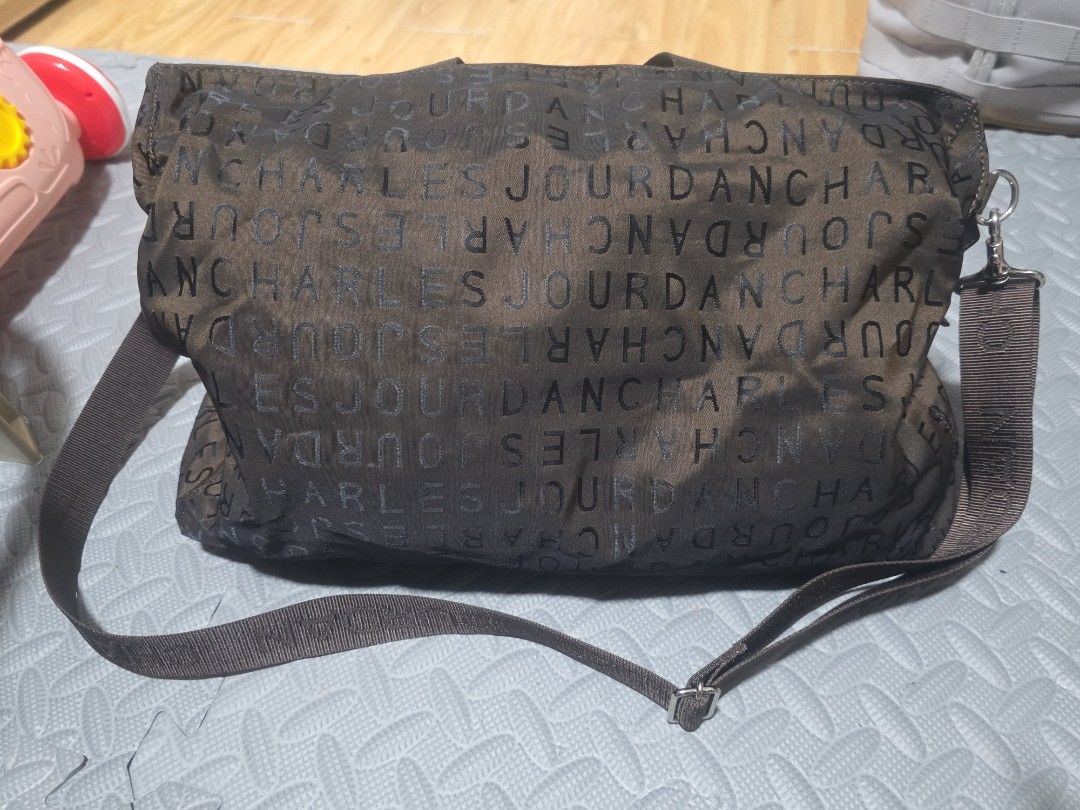CHARLES JOURDAN 2-WAY BAG (Category: Shoulder Bags) located in Manila. Submitted by yammm23 (Listing ID 1463931509, Image 1). Description: Preloved Charles Jourdan Shoulder/Crossbody Bag ✨ Stylish & unique printed design ✨ Spacious and practical for everyday use ✨ With back zipper pocket ✨ 3-compartment - 2 Magnet closure and 1 zipper for the main compartment ✨ Adjustable strap ✨ Good preloved condition — see photos for actual condition Loc. Las 