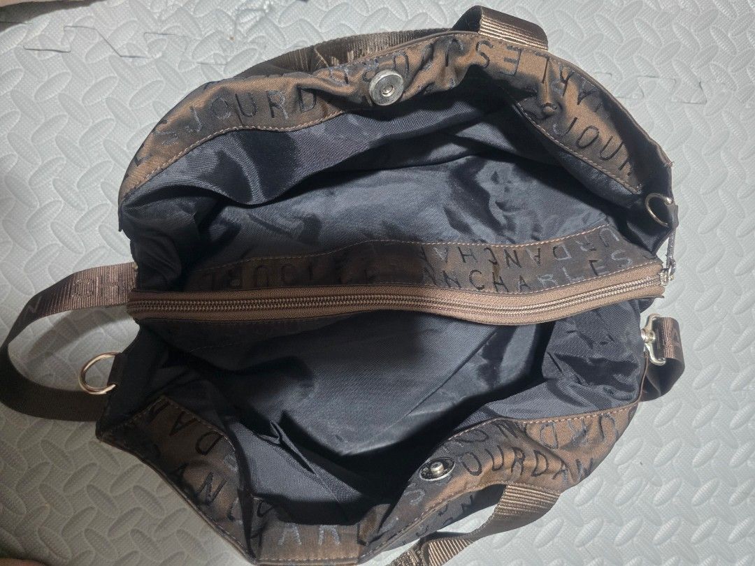 CHARLES JOURDAN 2-WAY BAG (Category: Shoulder Bags) located in Manila. Submitted by yammm23 (Listing ID 1463931509, Image 3). Description: Preloved Charles Jourdan Shoulder/Crossbody Bag ✨ Stylish & unique printed design ✨ Spacious and practical for everyday use ✨ With back zipper pocket ✨ 3-compartment - 2 Magnet closure and 1 zipper for the main compartment ✨ Adjustable strap ✨ Good preloved condition — see photos for actual condition Loc. Las 