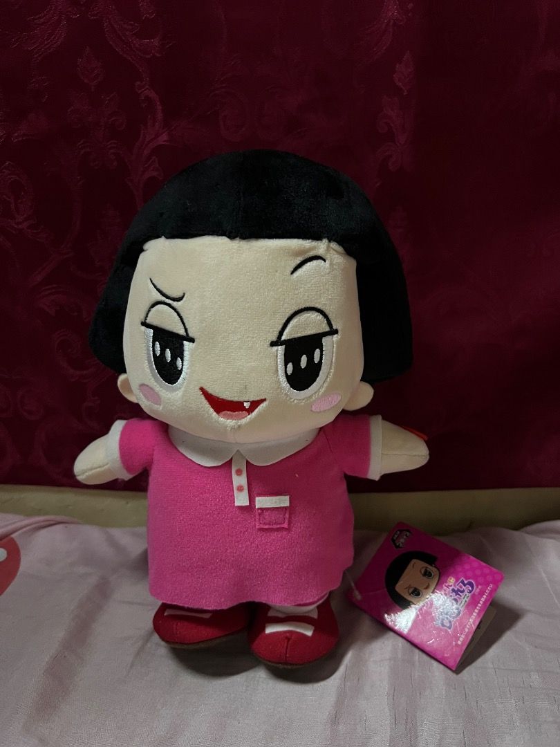 Chibi Maruko Chan Plush Toy (Category: Plushies & Soft Toys) located in Bulacan. Submitted by haven_plushie_dolls.888 (Listing ID 1463842088, Image 1). Description: - Adorable Chibi Maruko Chan plush toy. - Features her iconic pink dress and red shoes. - Made with soft, huggable material. - A must-have for any Maruko Chan anime fan. - Includes original tag..