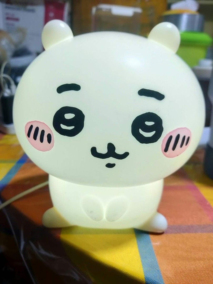 Chiikawa Character Night Light Lamp (Category: Lighting) located in Manila. Submitted by jhs31 (Listing ID 1463917886, Image 1). Description: - Adorable Chiikawa character night light - Versatile power options: USB or AAA batteries - Features a convenient ON/OFF switch - Ideal for children's bedrooms or as a charming desk accessory - Officially made by Nagano / Chiikawa committee - NO BATTERY COVER -SELLING AS IS - CROSSPOSTED.