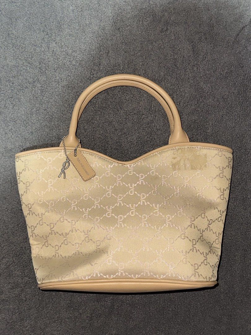 Christian Dior Monogram Canvas Tote Bag (Category: Luxury Bags & Wallets) located in Tarlac. Submitted by luan_qw (Listing ID 1463895786, Image 1). Description: - Authentic Christian Dior Monogram Tote - Color: Beige canvas with tan leather trim - Iconic 'D' logo pattern all over - Includes a small charm - Ideal size for everyday essentials - Condition: Good, with a few minor marks on the canvas.
