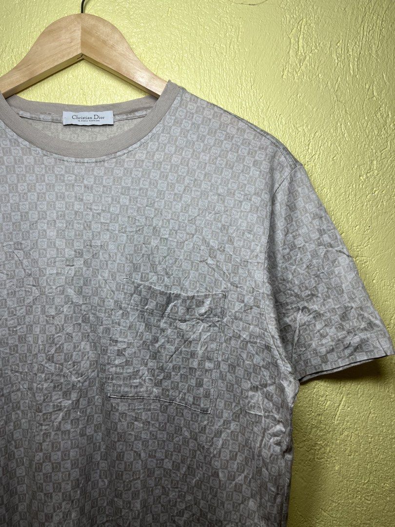 Christian Dior Monogram Pocket T-Shirt (Category: Tshirts & Polo Shirts ) located in San Isidro, Leyte. Submitted by tigerxdx3580077 (Listing ID 1463803547, Image 2). Description: - Authentic Christian Dior T-Shirt - Color: Light Beige - All-over Dior Monogram Pattern - Single Chest Pocket - Material: 100% Mercerised Cotton - Made in Italy - Size: XS (20.5by24).