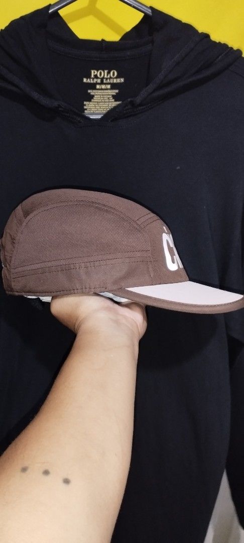 Ciele Athletics Brown 5 Panel Cap (Category: Caps & Hats) located in Manila. Submitted by beckster_nnline_luxuryshop (Listing ID 1463851468, Image 2). Description: - Brand: Ciele Athletics - Style: 5-panel cap - Features: White 'ciele' logo on front, adjustable strap at back - Ideal for: Running, casual wear - Condition: Good.
