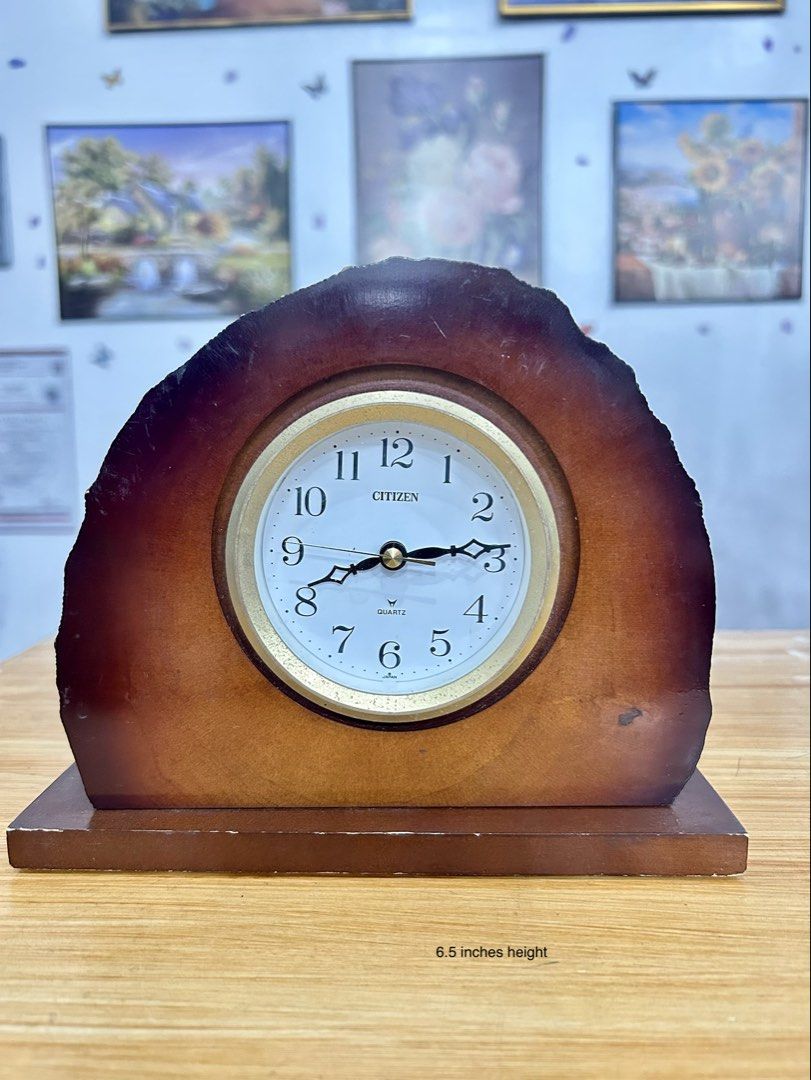Citizen Quartz Desk Clock in solid live-edge wood. (Category: Clocks) located in Bustos. Submitted by gthings.collectibles (Listing ID 1463849819, Image 1). Description: ✨Selling this authentic Citizen Quartz Desk Clock in solid live-edge wood. Super unique ng tree-ring silhouette at wood texture niya, perfect statement piece for your work desk, bedside table, or living room shelf! Brand: Original Citizen (Quartz movement / Made in Japan) Size: 6
