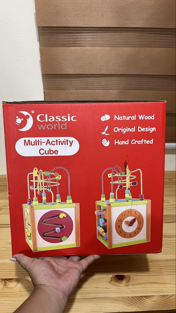 Classic World Multi-Activity Cube - Wooden Educational Toy (Category: Infant Playtime) located in Santa Rosa. Submitted by mommy.cole.affordable.stuff (Listing ID 1463802857, Image 3). Description: - Classic World Multi-Activity Cube - Made from natural, hand-crafted wood - Features: Bead maze, geometric shapes, clock - Promotes development of motor skills and cognitive abilities - Recommended for ages 2 and up.