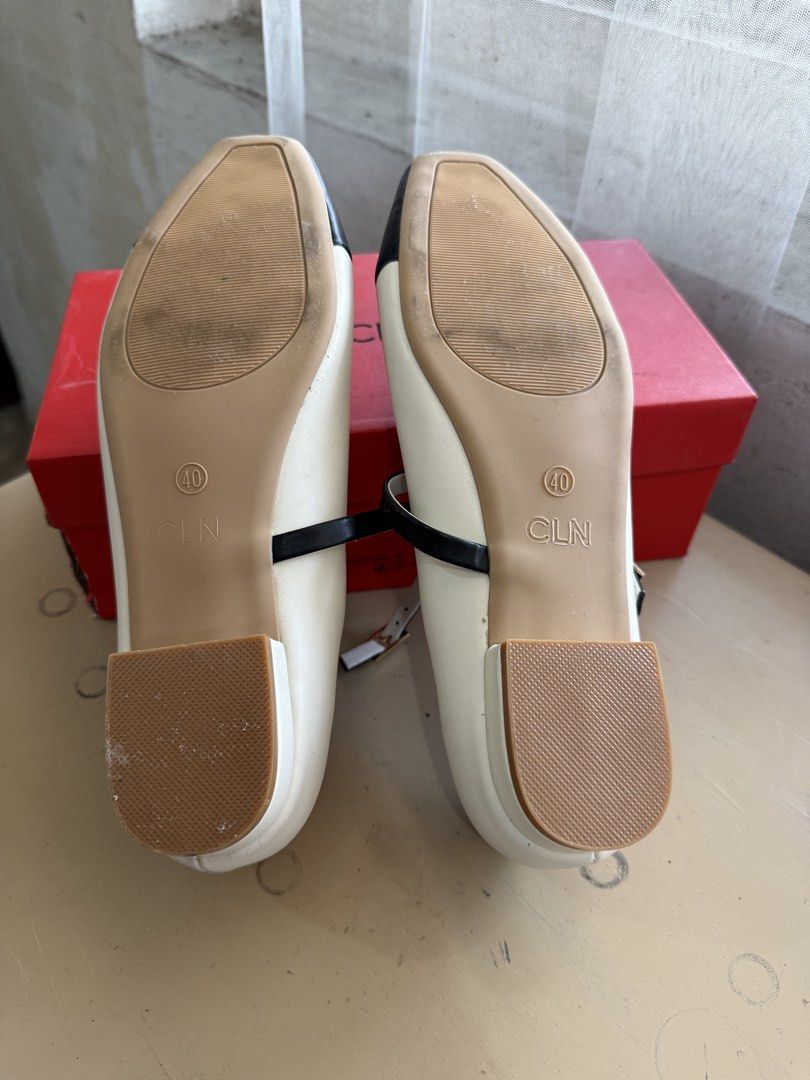 CLN Two-Tone Mary Jane Flats Size 40 (Category: Flats & Sandals) located in Cabuyao City. Submitted by arral (Listing ID 1463806643, Image 2). Description: - Cream and black cap-toe flats - Mary Jane strap with buckle closure - Square toe design - Size 40 - Comes with original box - Versatile for casual or dressy occasions.