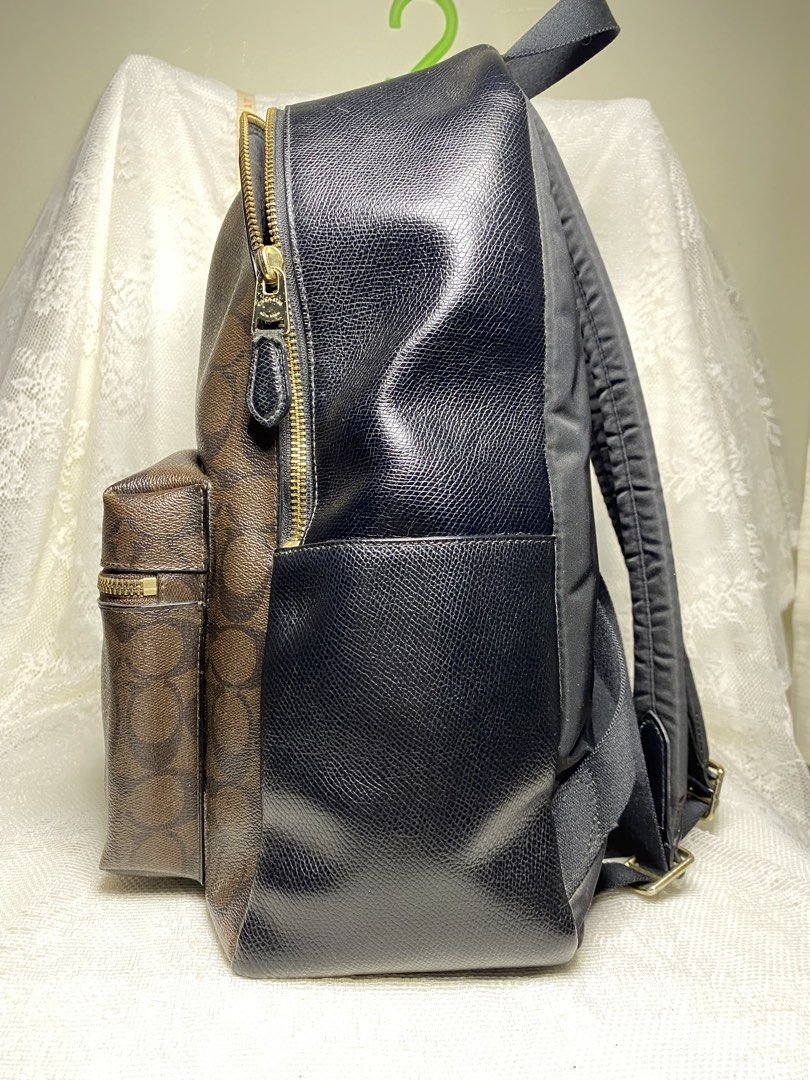Coach backpack (Category: Luxury Bags & Wallets) located in Angeles City. Submitted by noagrace (Listing ID 1463744090, Image 3). Description: Coach Signature Charlie Backpack coated canvas Very good condition Creed not readable due to leather wear Minimal signs of use (see last picture) P4500.