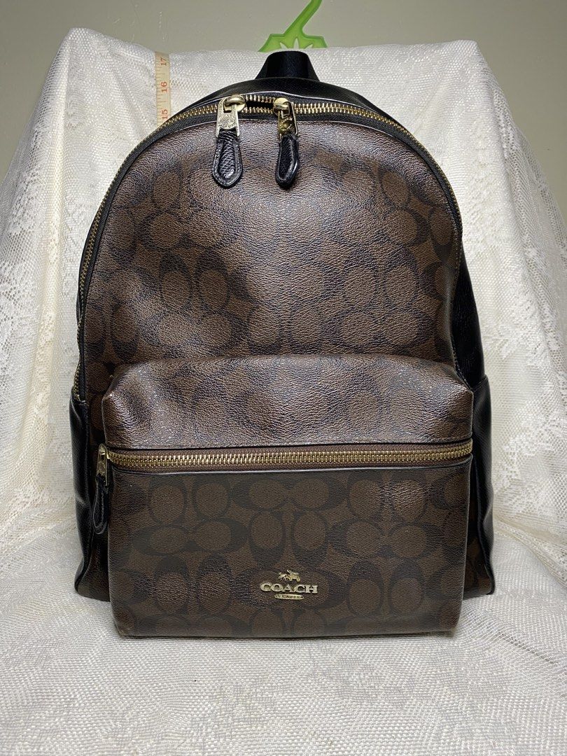 Coach backpack (Category: Luxury Bags & Wallets) located in Angeles City. Submitted by noagrace (Listing ID 1463744090, Image 1). Description: Coach Signature Charlie Backpack coated canvas Very good condition Creed not readable due to leather wear Minimal signs of use (see last picture) P4500.
