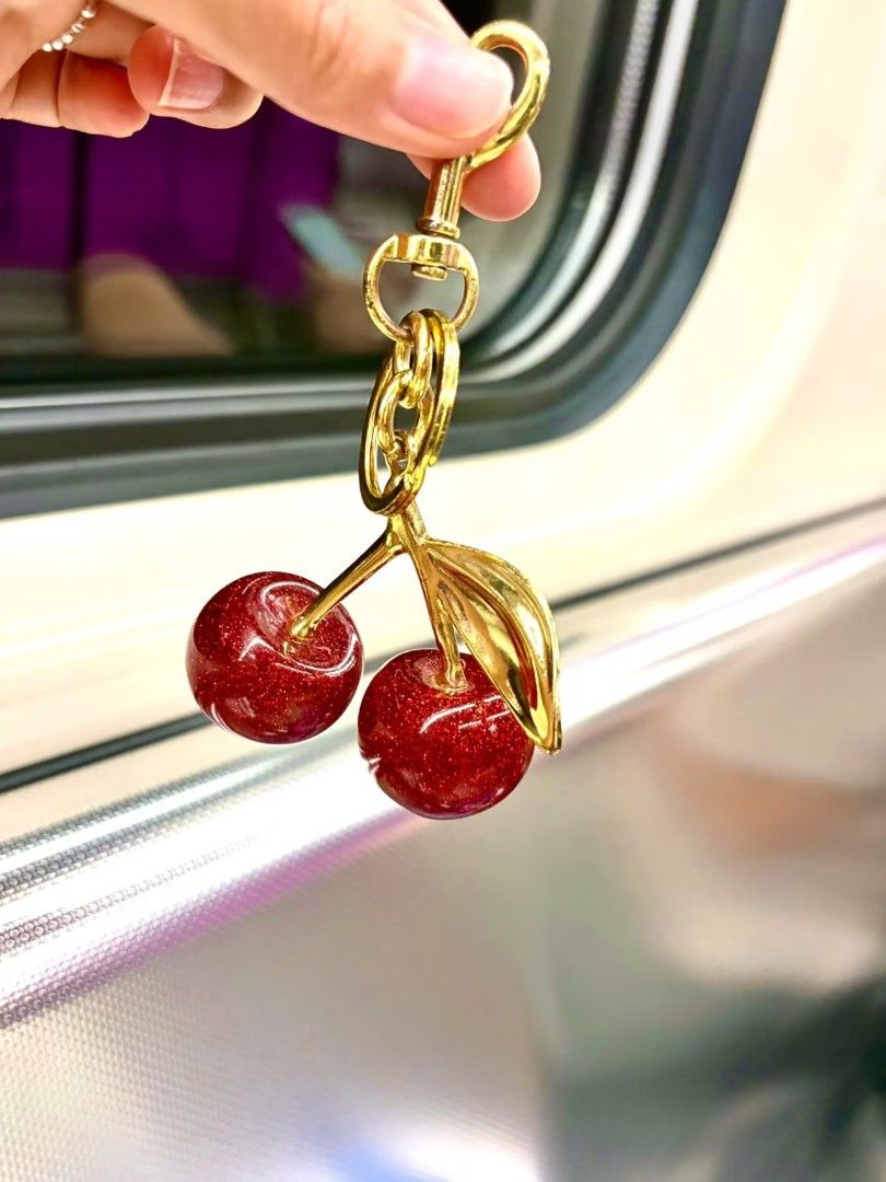 Coach Cherry Bag Charm (Category: Charms) located in Pasig City. Submitted by maryjanegr (Listing ID 1463776747, Image 3). Description: 🍒 OG from Factory Outlet 🍒 Complete with Paperbag, and Box 🍒 Taguig Location.