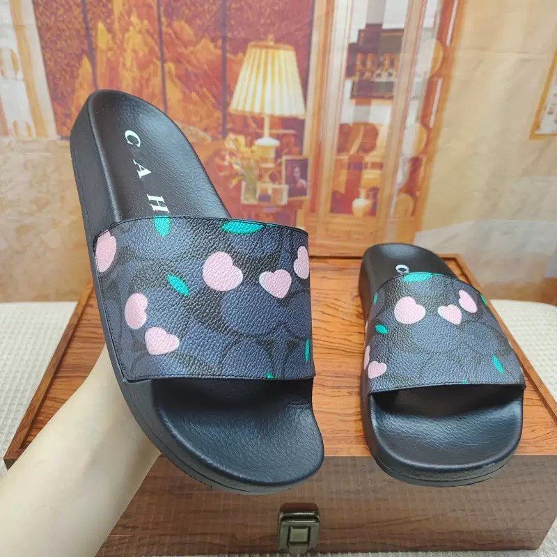 Coach Cherry Print Slides - Pink & Brown (Category: Slippers and slides) located in Manila. Submitted by randomreps (Listing ID 1463936231, Image 3). Description: - Super cute Coach slides - Adorable cherry print design - Available in pink and brown colorways - Easy slip-on style for convenience - Perfect for casual everyday wear.