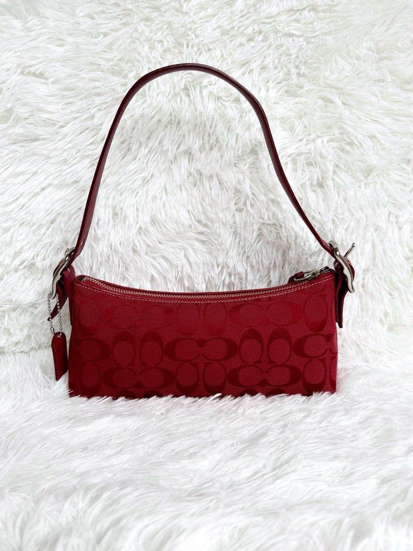 Coach Eastwest Baguette (Category: Luxury Bags & Wallets) located in Pavia. Submitted by kris0025 (Listing ID 1463808621, Image 1). Description: Very rare red baguette Rank S Highly sought after bag and open for layaway Can send more photos via dm to avoid being used for scams.
