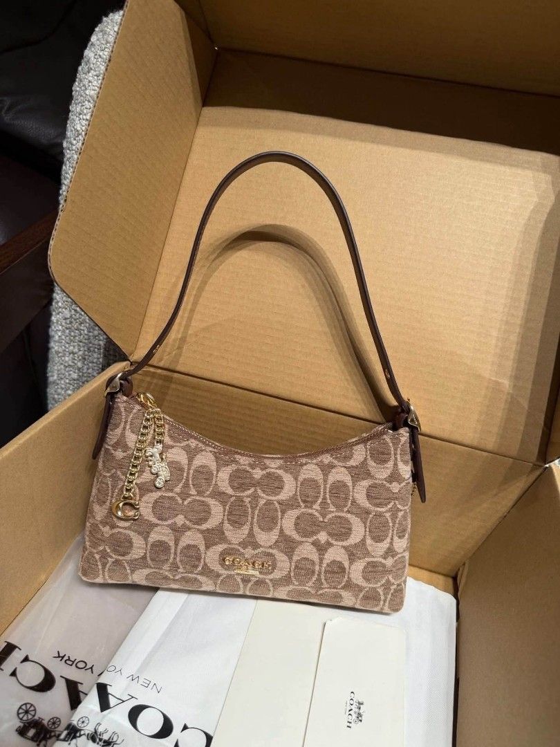 Coach Emeilia Shoulder Bag (Category: Shoulder Bags) located in Quezon City. Submitted by bagsboutiqueph (Listing ID 1463881788, Image 1). Description: LAST PRICE POSTED. LIMITED STOCKS! BRANDNEW WITH INCLUSIONS. COLOR MAY SLIGHTLY VARY IN ACTUAL DUE TO LIGHTING AND CAMERA SETTING. OTHER PHOTOS WILL BE SEND DURING PURCHASE AND FOR SURE BUYERS ONLY. WHEN IN DOUBT, DO NOT ORDER. THANK YOU..