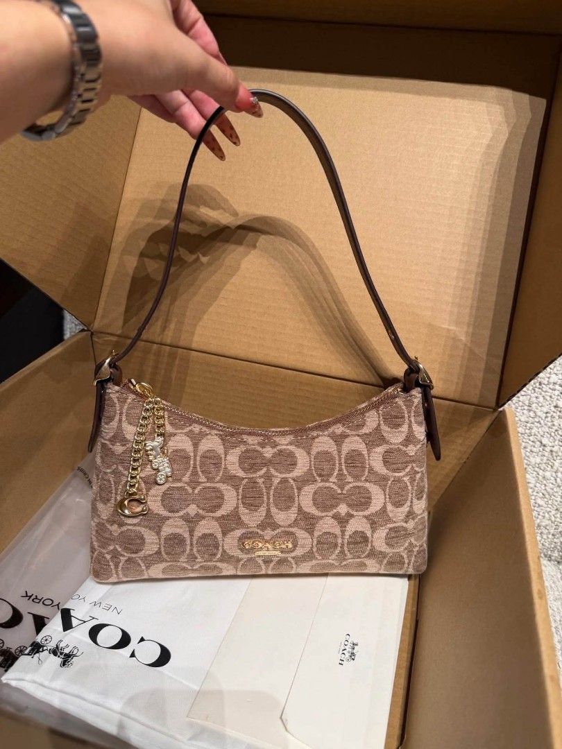 Coach Emeilia Shoulder Bag (Category: Shoulder Bags) located in Quezon City. Submitted by bagsboutiqueph (Listing ID 1463881788, Image 2). Description: LAST PRICE POSTED. LIMITED STOCKS! BRANDNEW WITH INCLUSIONS. COLOR MAY SLIGHTLY VARY IN ACTUAL DUE TO LIGHTING AND CAMERA SETTING. OTHER PHOTOS WILL BE SEND DURING PURCHASE AND FOR SURE BUYERS ONLY. WHEN IN DOUBT, DO NOT ORDER. THANK YOU..