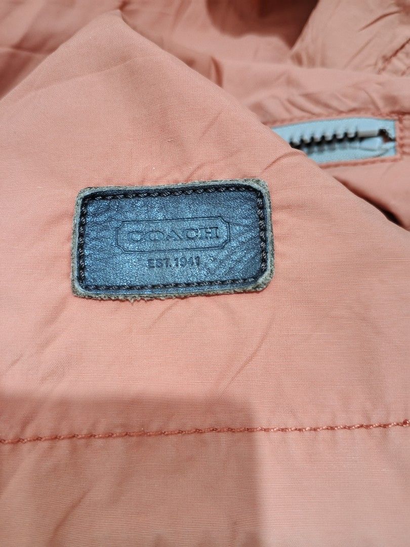 COACH HOODED JACKET (Category: Coats, Jackets and Outerwear) located in Bulacan. Submitted by annenicathriftthriftlang (Listing ID 1463850761, Image 3). Description: COACH EST. 1941 HOODED JACKET - XL ON TAG Dimes: 25 x 28 on tape (XL) Width: 25 inches pit to pit Length: 28 inches Sleeve: 27 inches Size: XL on tag, fits L to XL Tela: Nylon / Cotton blend - windbreaker, manipis pero quality Color rate: 7/10 - Condition: Excellent - buo lahat zippe