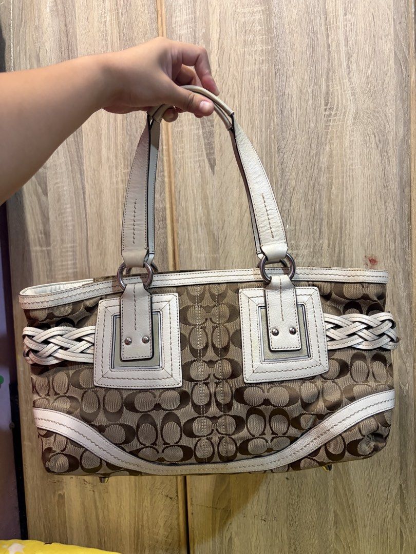 Coach Jacquard Braided Soho Bag (Category: Luxury Bags & Wallets) located in Manila. Submitted by cb_curations (Listing ID 1463877025, Image 2). Description: Vintage but modern design 🎀 - Classic Coach monogram canvas shoulder bag - White leather trim and braided accents - Interior zip pocket and slip pocket - Spacious for essentials, kasya payong 😆 With signs of use. No rubs/runs. This is a vintage bag, please expect some normal signs of use. 
