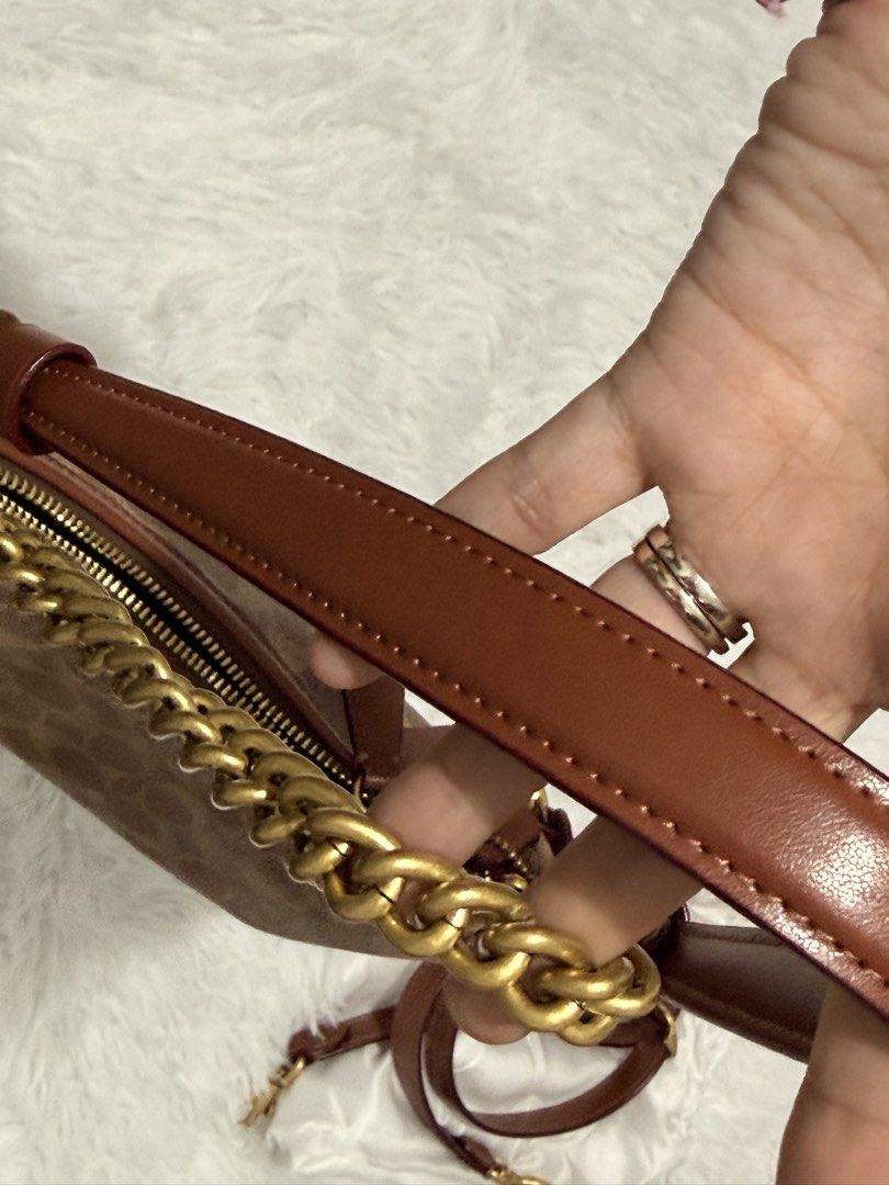 Coach Juliet Shoulder Bag 25 (Category: Luxury Bags & Wallets) located in General Trias. Submitted by tinyfits_outgrown (Listing ID 1463844067, Image 2). Description: [AUTHENTIC] Coach Juliet Shoulder Bag 25 in Signature Canvas (Tan/Rust) Condition: Excellent / Like New (Very smooth leather trim, clean interior lining) Style Code: CAM26 (Coach Retail / Boutique Line) Original Retail Price: ~₱28,000+ Comes COMPLETE with all 3 original straps.