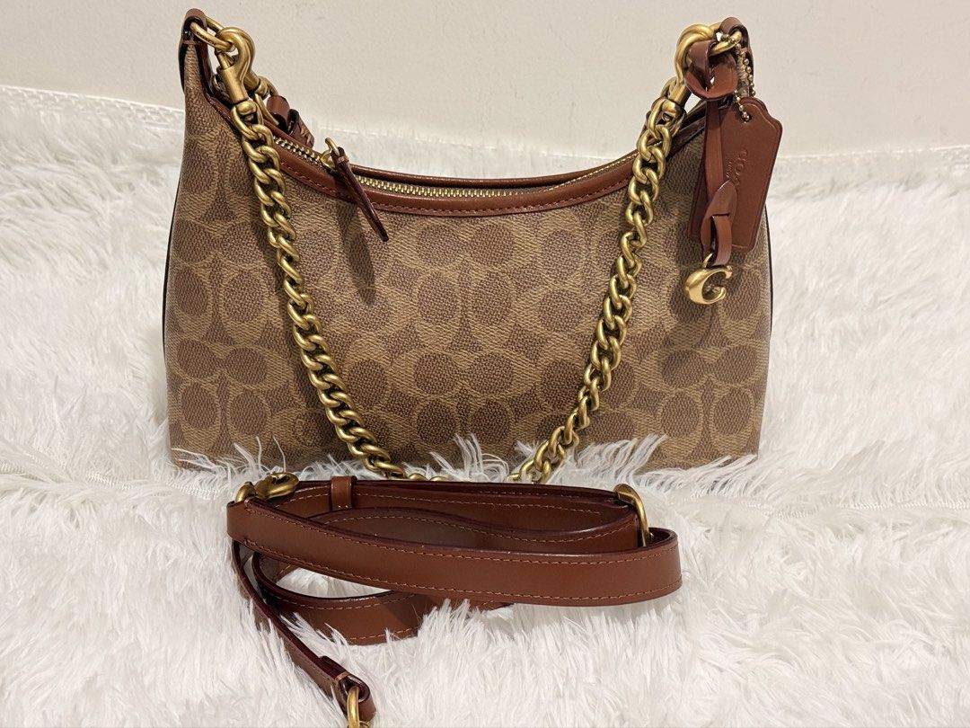 Coach Juliet Shoulder Bag 25 (Category: Luxury Bags & Wallets) located in General Trias. Submitted by tinyfits_outgrown (Listing ID 1463844067, Image 1). Description: [AUTHENTIC] Coach Juliet Shoulder Bag 25 in Signature Canvas (Tan/Rust) Condition: Excellent / Like New (Very smooth leather trim, clean interior lining) Style Code: CAM26 (Coach Retail / Boutique Line) Original Retail Price: ~₱28,000+ Comes COMPLETE with all 3 original straps.
