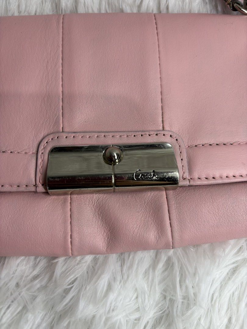 Coach Kristin wristlet mini bag (Category: Shoulder Bags) located in Cainta. Submitted by anneganda11 (Listing ID 1463926962, Image 2). Description: Coach kristin leather flap wristlet mini bag in baby pink.