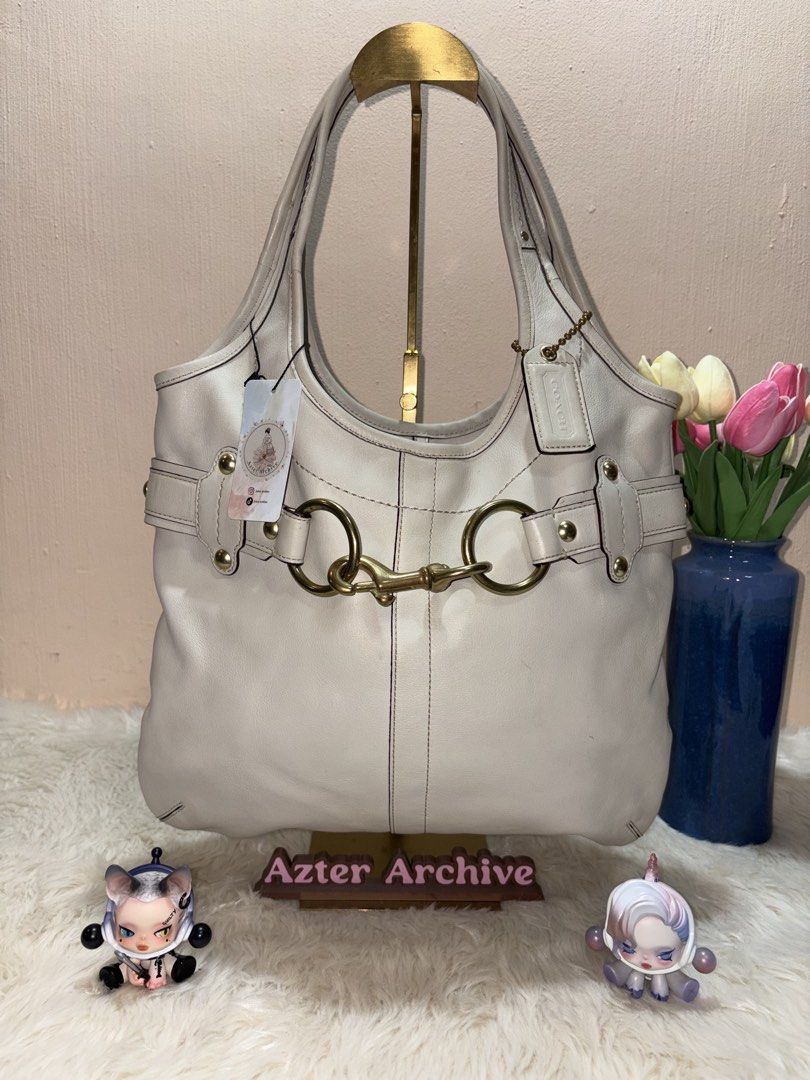 Coach Legacy Ergo Belted Tote (Category: Luxury Bags & Wallets) located in Angeles City. Submitted by azter.archive (Listing ID 1463775490, Image 1). Description: Like new, no issue. Also posted on my IG account- azter.achive 💕.
