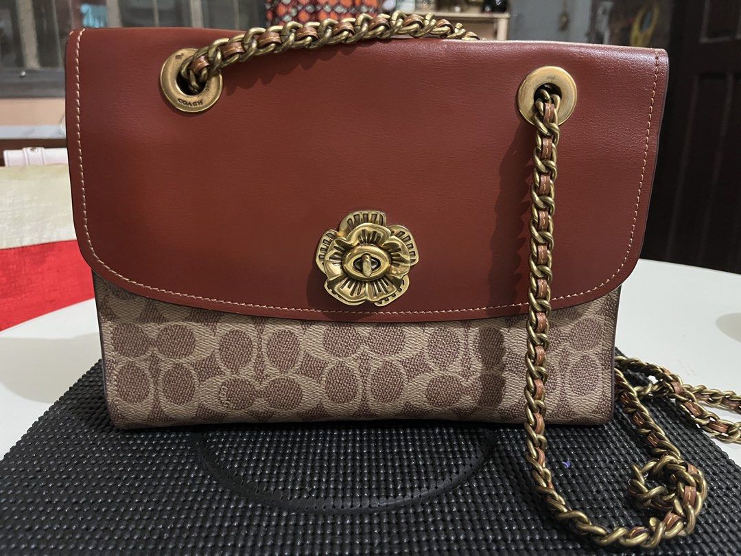 Coach Parker Signature C (Category: Luxury Bags & Wallets) located in Manila. Submitted by someoneanyone (Listing ID 1463755211, Image 1). Description: Coach Parker Signature C Has one signal small scratches and has little wear due to being used.