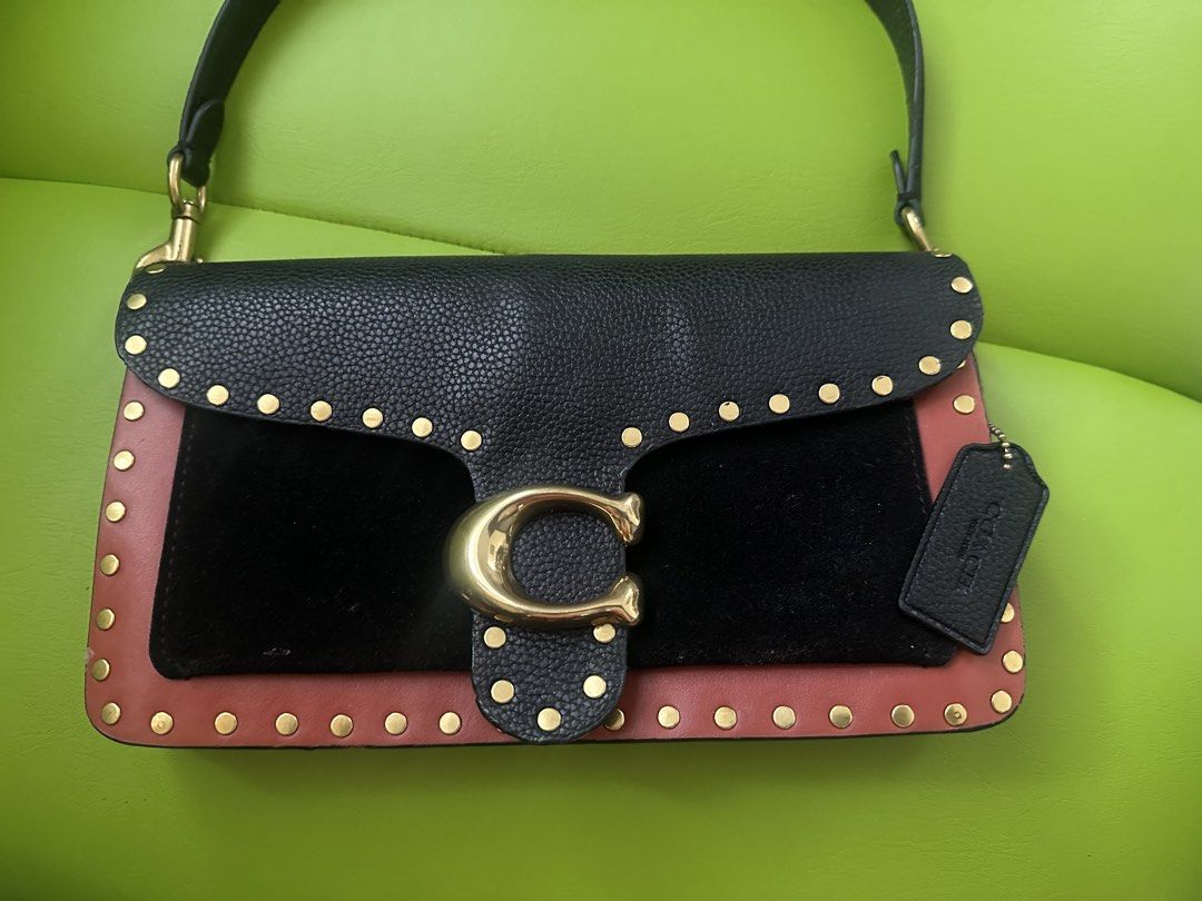 Coach Tabby (Category: Shoulder Bags) located in Manila. Submitted by quintanadm21299 (Listing ID 1463559767, Image 1). Description: RFS: need space, decluttering impulse buy bags. Lugi sale 🤣 Self Authentication po, not sure but thick hangtag, coach lining inside the Zipper. 2. Coach Tabby Shoulder Bag 26 in Black Leather & Suede with Rivets / Studs * Dark purple inside * Flaws on the sides look photos, i got it as is. .