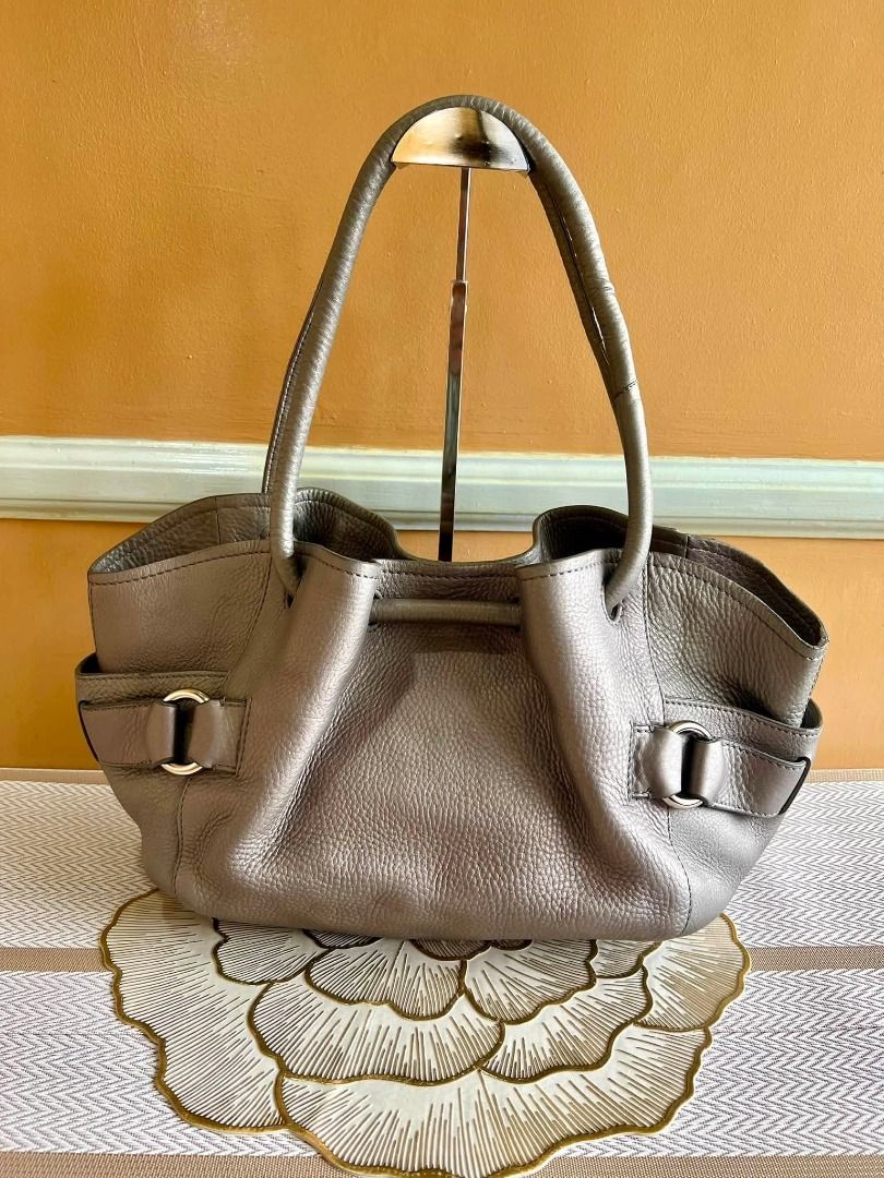 Cole Haan Brand Shoulder Bag (Category: Shoulder Bags) located in Quezon City. Submitted by bellafashion08 (Listing ID 1463788808, Image 3). Description: Dimension: - Height = 7 in. - Length = 12 in. * From U.S * Nice in actual .