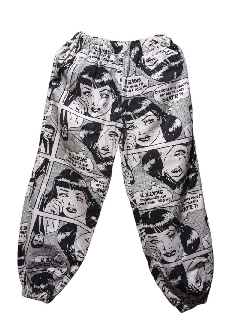 Comic Print Pants with Elastic Waistband (Category: Jeans) located in Maasim. Submitted by ukayganda25 (Listing ID 1463891254, Image 1). Description: - Unique comic book print featuring crying women and humorous text like 'Oh God! Why Can't My Boyfriend Skate?!' - Comfortable elastic waistband for a relaxed fit - Baggy, casual style perfect for everyday wear - Stand out with this one-of-a-kind design.