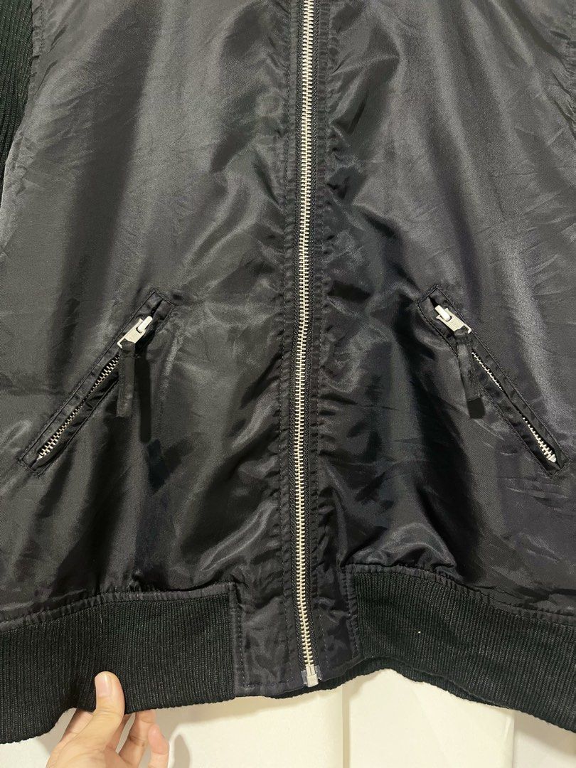 Comme ca Ism Bomber Jacket with Knit Sleeves (Category: Coats, Jackets and Outerwear) located in Baguio. Submitted by miisthyshop.ph (Listing ID 1463861789, Image 2). Description: Comme ca Ism - Style: Black Bomber Jacket - Size: L on tag stretch best fit to small - medium - Front Material: Nylon with zip closure - Pockets: Two zip pockets - Sleeves & Back Material: Black knit Note: Im selling ukay ukay please manage your expectations. Wash befor