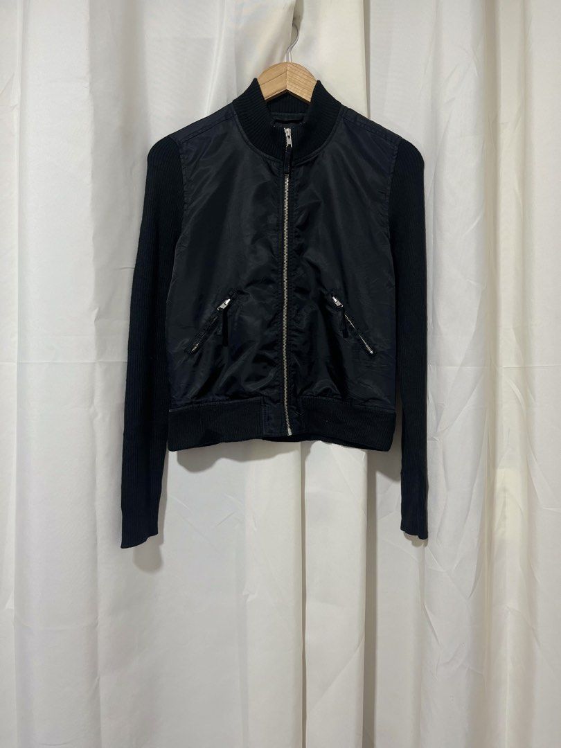 Comme ca Ism Bomber Jacket with Knit Sleeves (Category: Coats, Jackets and Outerwear) located in Baguio. Submitted by miisthyshop.ph (Listing ID 1463861789, Image 1). Description: Comme ca Ism - Style: Black Bomber Jacket - Size: L on tag stretch best fit to small - medium - Front Material: Nylon with zip closure - Pockets: Two zip pockets - Sleeves & Back Material: Black knit Note: Im selling ukay ukay please manage your expectations. Wash befor