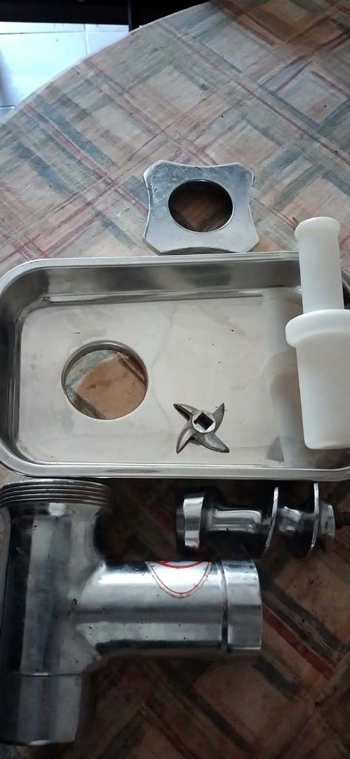 Commercial Stainless Steel Meat Grinder (Category: Juicers, Blenders & Grinders) located in Lingayen. Submitted by myrahpasil83880 (Listing ID 1463843329, Image 1). Description: - Heavy duty meat grinder - Stainless steel construction - Powerful motor - Includes multiple grinding plates and pusher - Tested and working - Perfect for home or commercial use.