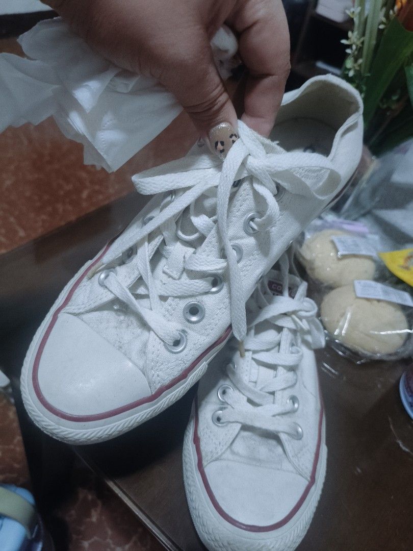 Converse All Star White Canvas Low Top Sneakers (Category: Sneakers) located in Apalit. Submitted by oemiluanne (Listing ID 1463898213, Image 3). Description: - Classic white Converse low tops - Canvas material with red trim - Laces included - Soles show some wear but have plenty of grip - Ideal for everyday wear - Size: 7 US Women's size 7.5 💯 orig bought at sm pampanga RS: de- clutter need ng linis.