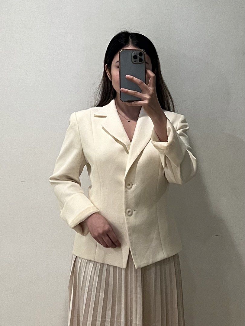 High Quality Cream Blazer (Category: Coats, Jackets and Outerwear) located in Makati City. Submitted by warm.abc123 (Listing ID 1463861812, Image 1). Description: - Cream colored blazer - Single button closure - Lapel collar - Long sleeves - Versatile for layering or wearing on its own - Pairs well with skirts or trousers.