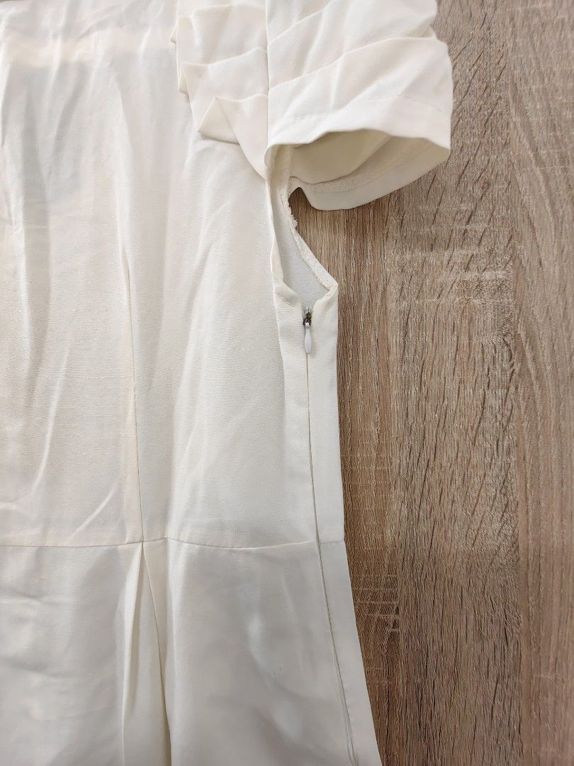 Cream Puff Sleeve Button Front Dress with Pockets (Category: Dresses) located in Las Pinas. Submitted by offtonewhome (Listing ID 1463793078, Image 3). Description: - Chic cream-colored dress - Short puff sleeves with charming ruffled detail - Convenient button-front closure - Functional side pockets - Flattering knee-length cut - Versatile for casual or semi-formal events - Effortless to style for any occasion.