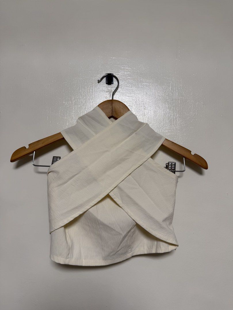 Cream Textured Multi Wrap Halter Neck Crop Top (Category: Sleeveless) located in Manila. Submitted by don_p (Listing ID 1463864026, Image 1). Description: S to M - Cream textured wrap halter neck crop top - Smocked back for a comfortable fit - Ties at the back of the neck - Versatile: great for beach days or nights out - Pairs well with high-waisted bottoms.