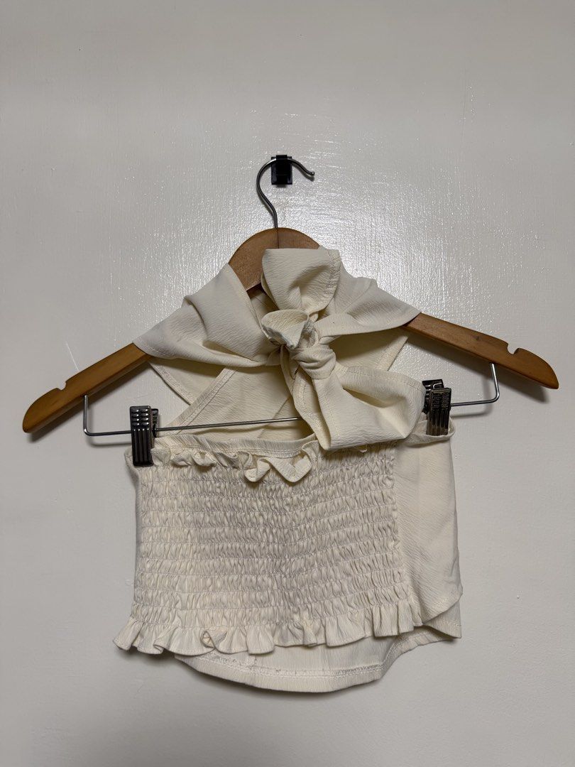 Cream Textured Multi Wrap Halter Neck Crop Top (Category: Sleeveless) located in Manila. Submitted by don_p (Listing ID 1463864026, Image 2). Description: S to M - Cream textured wrap halter neck crop top - Smocked back for a comfortable fit - Ties at the back of the neck - Versatile: great for beach days or nights out - Pairs well with high-waisted bottoms.