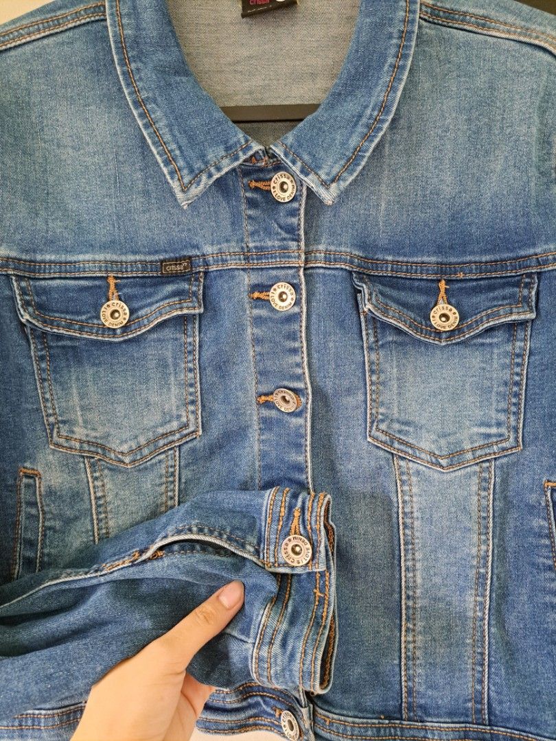 CRISSA Button Up Denim / Maong Jacket (Size S - L) (Category: Coats, Jackets and Outerwear) located in Taytay. Submitted by mari_refind (Listing ID 1463787847, Image 1). Description: Brand: Crissa Jeans Color: Classic Blue Denim Design: Metal buttons, dual button-flap chest pockets, traditional collar, structured denim with slight stretch 📍Taytay, Rizal Pay via Gcash / Maya / Bank Transfer. Kindly message if interested. Thank you😊 #crissa #cris