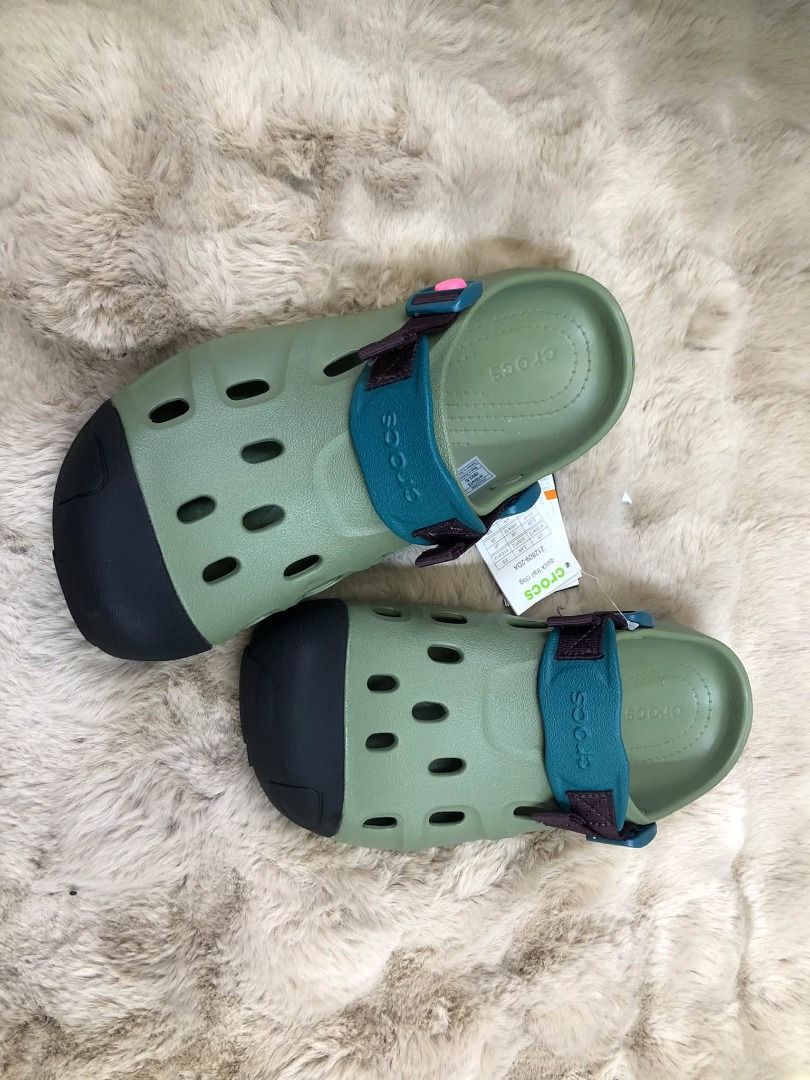 Crocs All-Terrain Clog (Category: Slippers & Slides) located in Manila. Submitted by khielnatha93179 (Listing ID 1463802558, Image 3). Description: - Size: Men 7 to Men 11 - Available Colors: Cream with Purple Straps, Olive Green with Teal Straps - Features: Adjustable straps for a secure fit, rugged soles for enhanced traction - Ideal for: Outdoor adventures, hiking, gardening, or everyday casual wear.