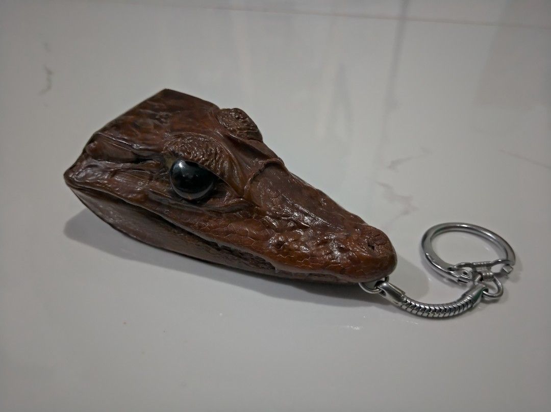 Crocs Keychain (Category: Accessory Holder, Box & Organizers) located in General Trias. Submitted by mervcorner (Listing ID 1463930291, Image 1). Description: Keychain (Brown) Size: 3.5 inches Crocodile Head With Coin Purse Leather Rare Sobrang liit para lagyan ng madaming barya kaya maganda ikabit nalang sa bag as keychain. Best sa leather bags. RFS: Decluttering Item Location: General Trias, Cavite Delivery thru Lalamove (At Buyer's Expense) Co