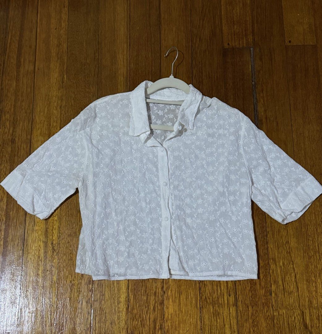 Cropped Blouse (Category: Blouses) located in Paranaque City. Submitted by declutternsell.729 (Listing ID 1463774471, Image 1). Description: - Cute white cropped shirt - Features all-over broderie anglaise floral pattern - Collared neckline with button-up front - Short sleeves - Versatile for casual outings or as a beach cover-up BOUGHT IN THAILANS USED ONCE.