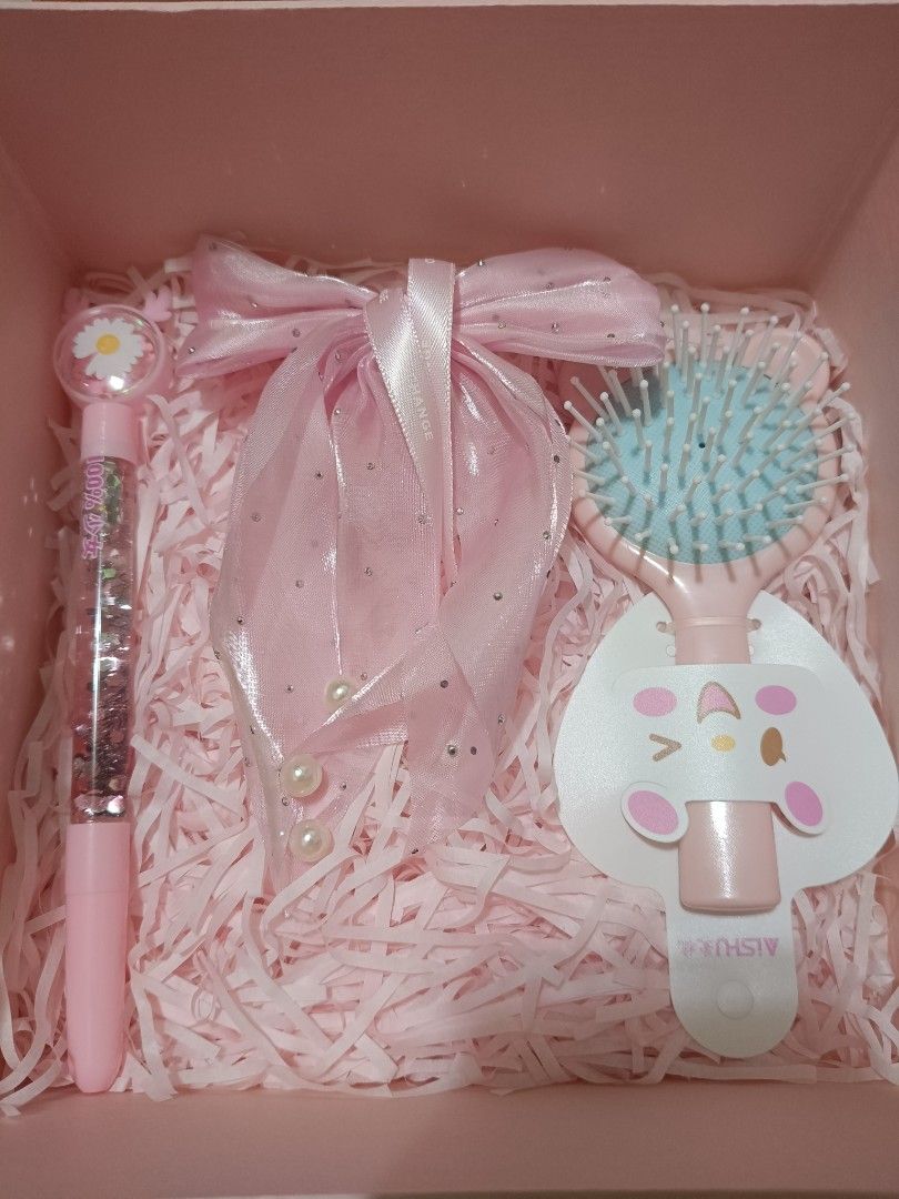 Cute Pink Gift Set with Accessories (Category: Kids Toys) located in Imus. Submitted by mrpp03 (Listing ID 1463927067, Image 3). Description: - Adorable pink gift set - Includes: cute penguin hot water pack, small perfume bottle, hand cream - Also features: sparkly hairbrush, pen, and a fluffy pouch - Perfect for gifting or personal treat - Everything is pretty and pink! Pictures 2 to 7 are all the items included in the gift set. Items are placed