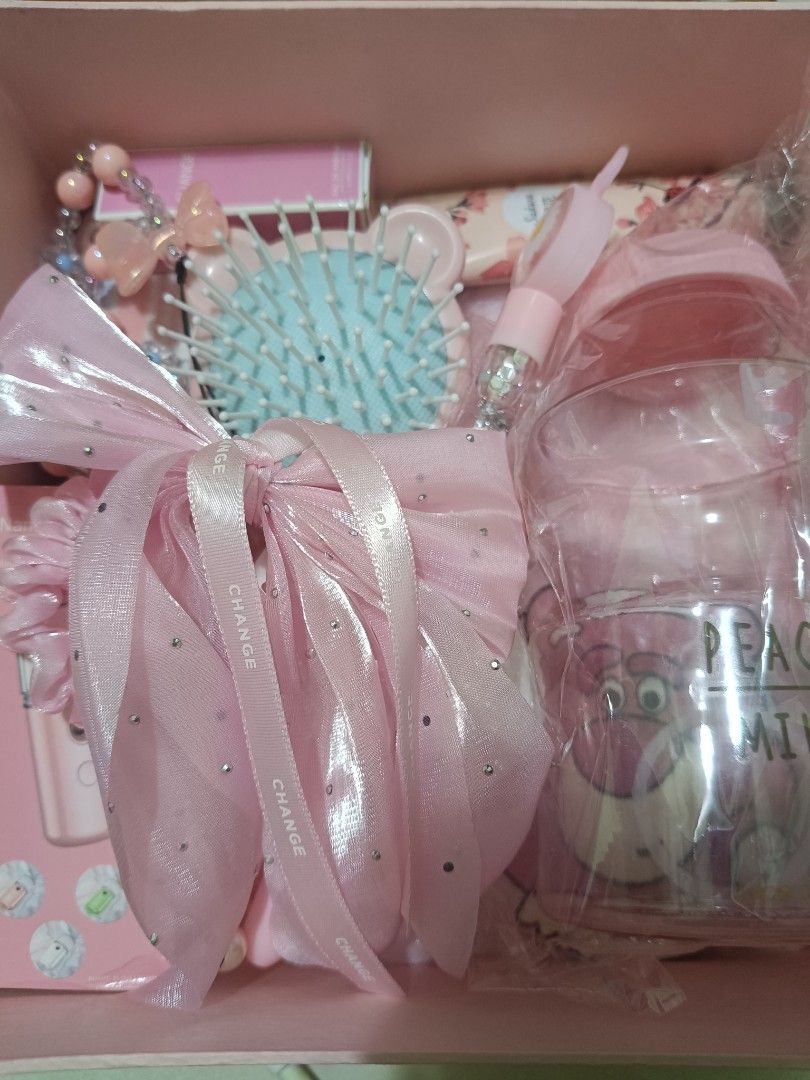 Cute Pink Gift Set with Accessories (Category: Kids Toys) located in Imus. Submitted by mrpp03 (Listing ID 1463927067, Image 1). Description: - Adorable pink gift set - Includes: cute penguin hot water pack, small perfume bottle, hand cream - Also features: sparkly hairbrush, pen, and a fluffy pouch - Perfect for gifting or personal treat - Everything is pretty and pink! Pictures 2 to 7 are all the items included in the gift set. Items are placed