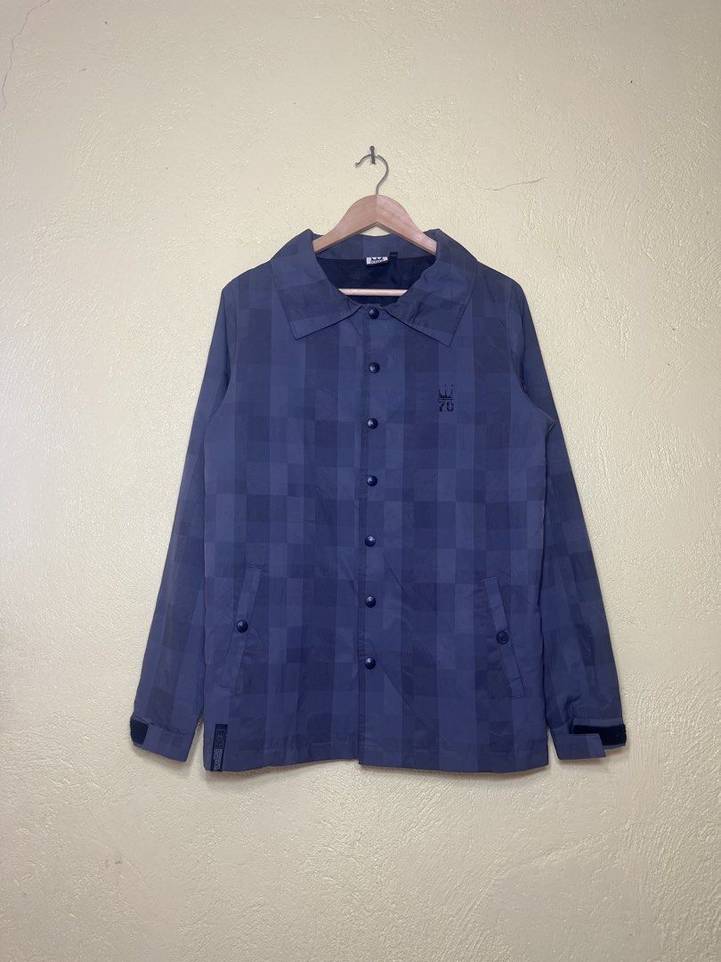 Dada Supreme Checked Coach Jacket Size M (Category: Coats, Jackets and Outerwear) located in San Isidro, Leyte. Submitted by tigerxdx3580077 (Listing ID 1463802687, Image 1). Description: - Authentic Dada Supreme coach jacket - Stylish checkered pattern - Snap button closure - Two functional front pockets - Size Medium (M) 21by28 - Ideal for casual layering.