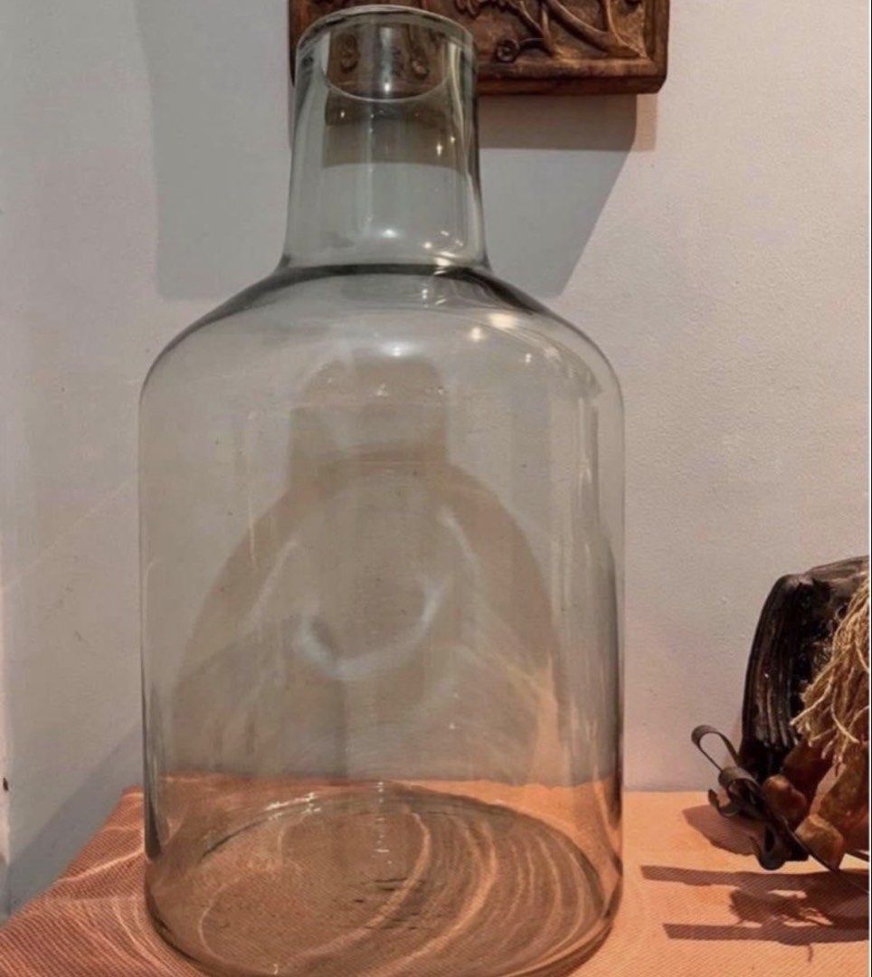 Dama Juana (Category: Other Home Decor) located in Taguig. Submitted by frank63studio (Listing ID 1463931792, Image 3). Description: Dama Juana 3,350php each 5pcs avbl clear thick glass new 20" - 22" height 4.5" dia (mouth) 12" dia (body) heavy perfect as an accent piece decor.